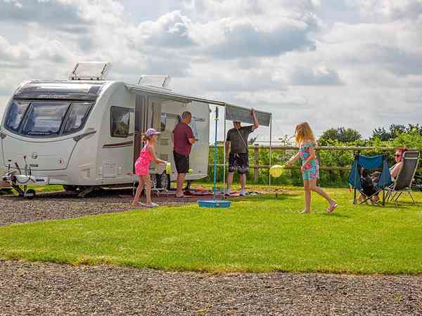 Electric asphalt and grass touring pitch