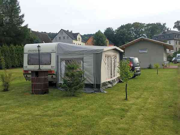 Electric optional grass and earth touring pitch