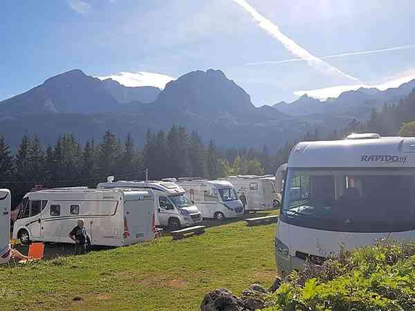 Electric optional grass and earth touring pitch