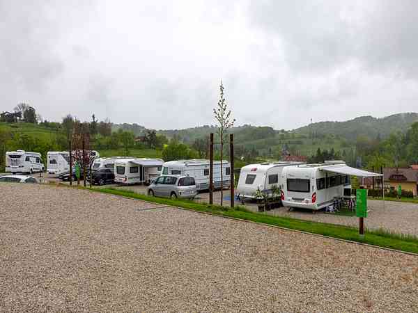 Powered cement/asphalt and grass site