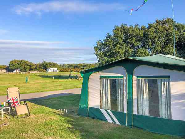 Electric optional hardstanding and grass touring pitch