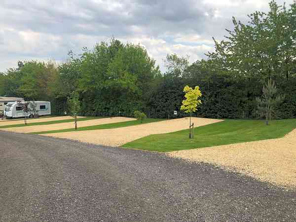Fully-serviced hardstanding and grass touring pitch Fully-serviced hardstanding and grass touring pitch