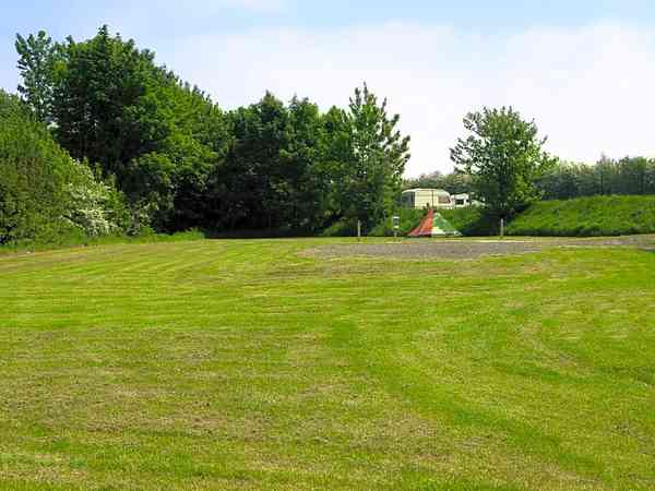 Motorcycle and tent only non-electric grass tent pitch (no cars)