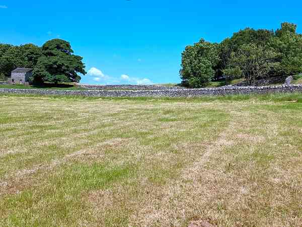 Unpowered grass tent or trailer tent site