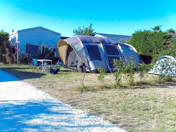 Electric hardstanding and grass pitch (solo)