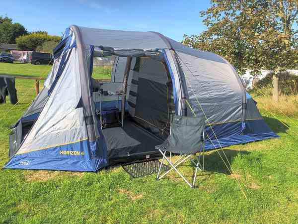 In the main tent field, hedged along the outside In the main tent field, hedged along the outside