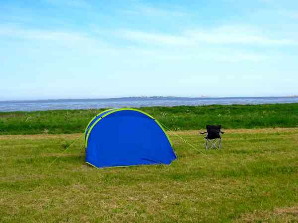 Non-electric grass tent or trailer tent pitch