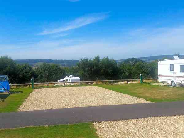Fully-serviced hardstanding touring pitch