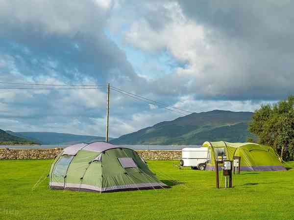 Grass pitch with Electric hook-up fro Tents with the view down Loch Sunart Grass pitch with Electric hook-up fro Tents with the view down Loch Sunart