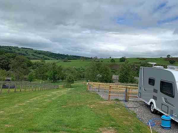 Fully-serviced grass touring pitch