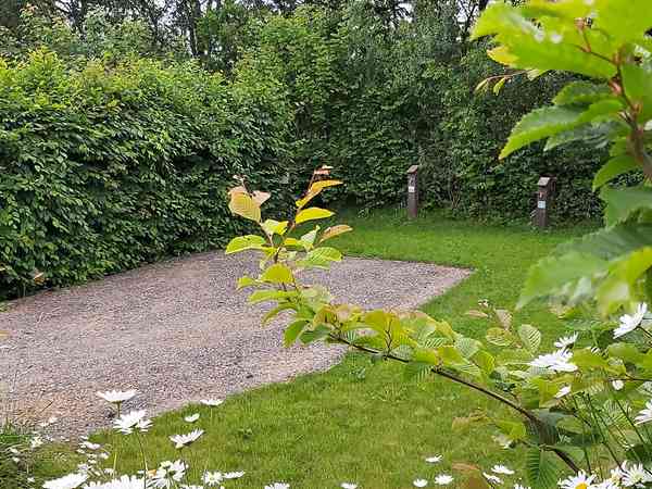 Fully-serviced hardstanding and grass touring pitch (medium)