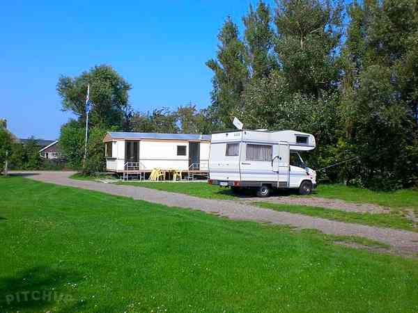 Electric optional hardstanding and grass motorhome pitch