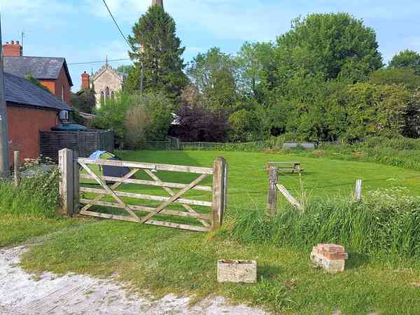 Non-electric grass and earth tent or campervan pitch