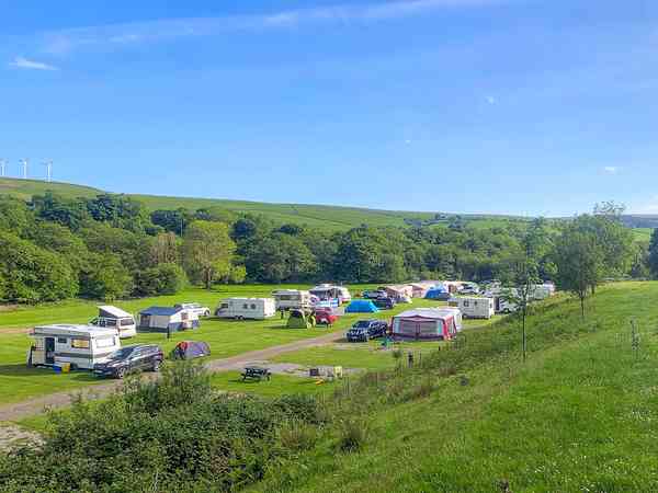 Electric hardstanding and grass pitch