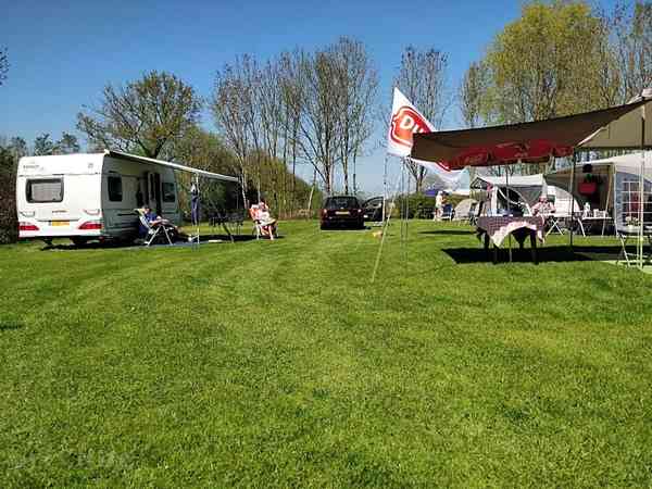 Electric grass and earth tent pitch