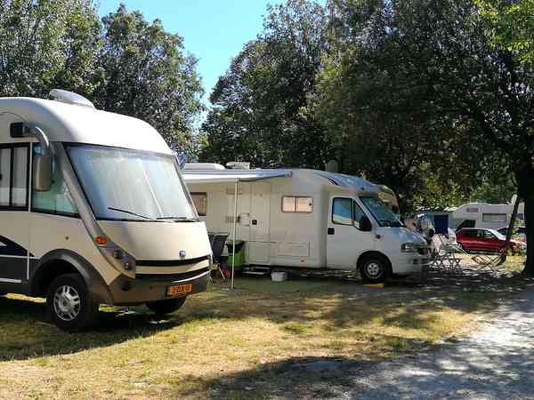 Powered asphalt and grass RV site