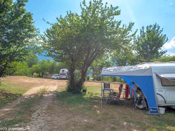 Power optional grass travel trailer site