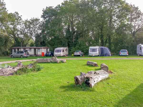 Electric hardstanding and grass pitch
