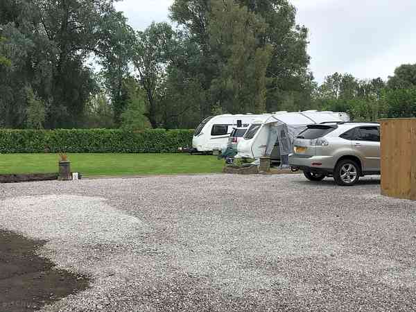 Powered gravel trailer site