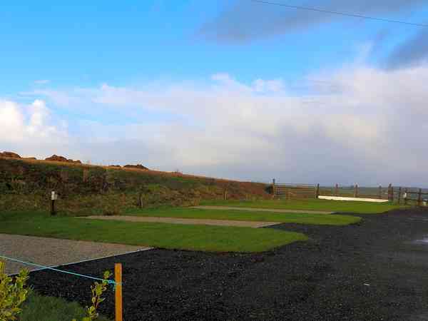 Grass and gravel pitch Grass and gravel pitch