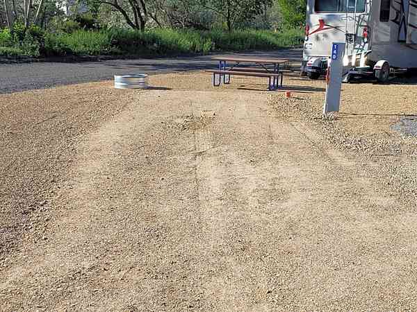 Economy fully-serviced gravel and hardstanding touring pitch