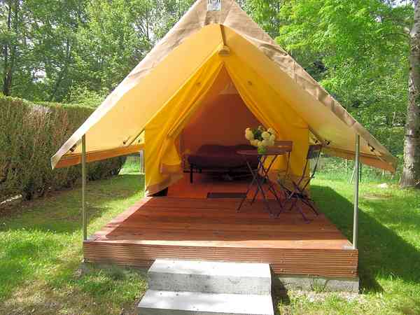 Safari tent on a wooden deck Safari tent on a wooden deck