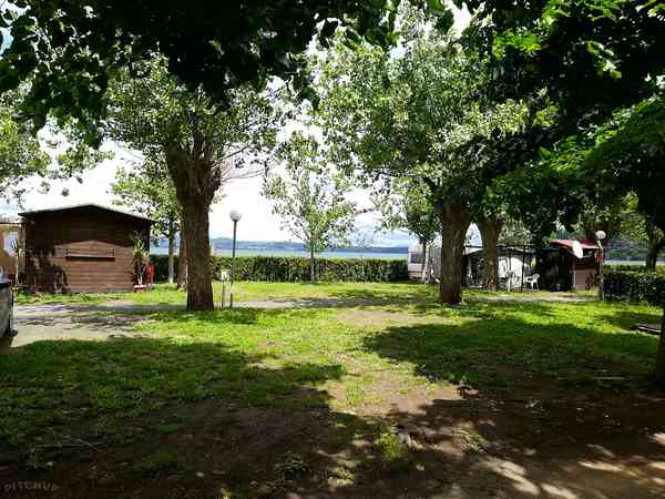 Electric grass tent or trailer tent pitch (lake view)
