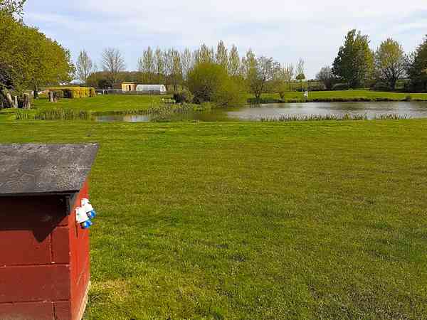 Powered grass touring site