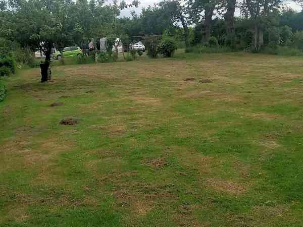 Non-electric grass tent or trailer tent pitch