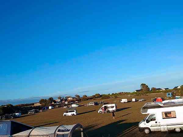 Non-electric grass and earth tent or motorhome pitch