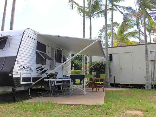 Fully-serviced hardstanding and grass touring pitch (private bathroom amenities)