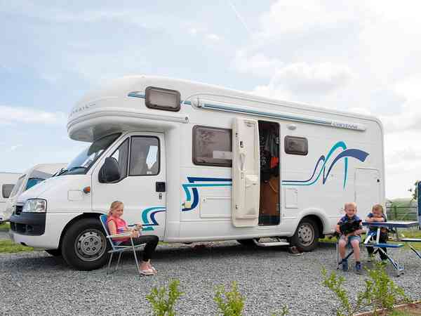 Fully-serviced cement/asphalt and grass touring pitch (premium)