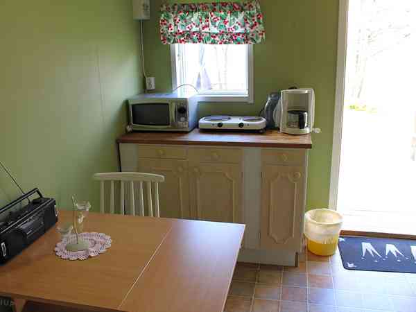 Dining table and kitchenette Dining table and kitchenette