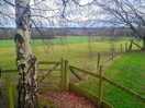 Gorgeous view out into the fields with the seating area for two visible on the right
