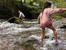 Kids getting cauld in cold beck river