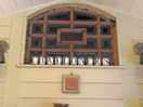 Pretty window where the light shines through and birds perch outside singing