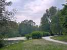 Tarmac cycle path that runs along edge of lake