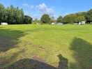 Large grass area in the middle for kids to play