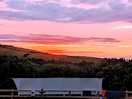 Sun setting over lynmouth holiday retreat