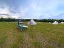 Pano of the bell tents and the field