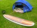 My tent and surfboard, at sunny meadows tourist park