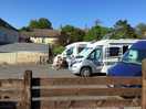 Three spaces at top of car park