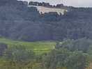 Site is 'underneath' this - view from road to campsite
