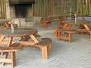 Undercover seating and open fire. so if it rains you can still have shelter and a fire.