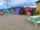 Colourful bench’s, washing up area, toilets and showers!