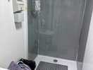 Spotless hot showers with 6 mins for a pound