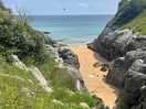 Coastal walk past lighthouse.