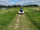 Following the quad trailer carrying our gear from the pitch back to car