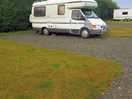 Plenty of room on hard standing and grass area next to it woth awning uo