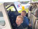 Wellesbourne wartime museum a volunteer allowed the boys to sit in the vampire plane.